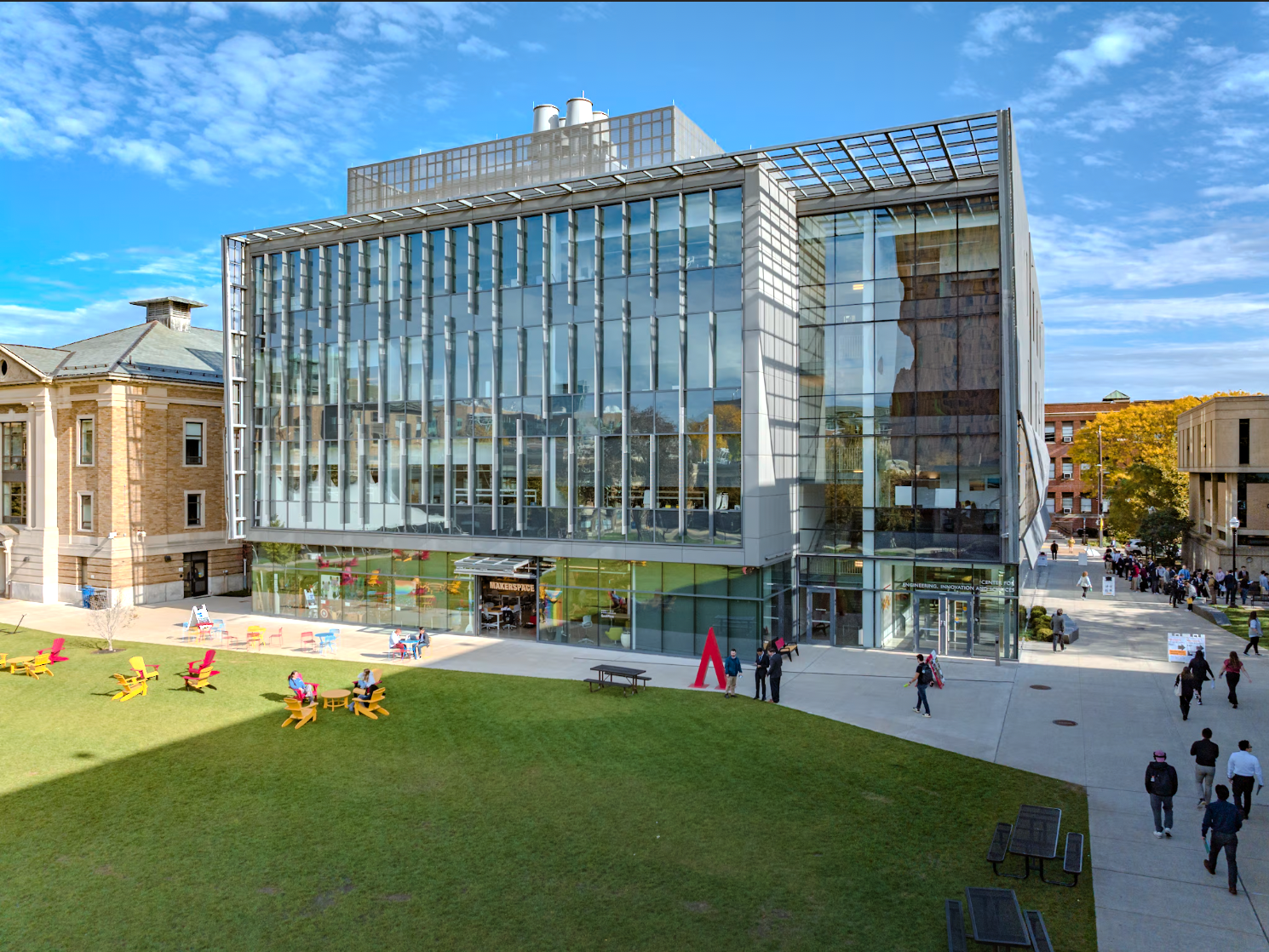 aerial view of a modern building and a grassy quad