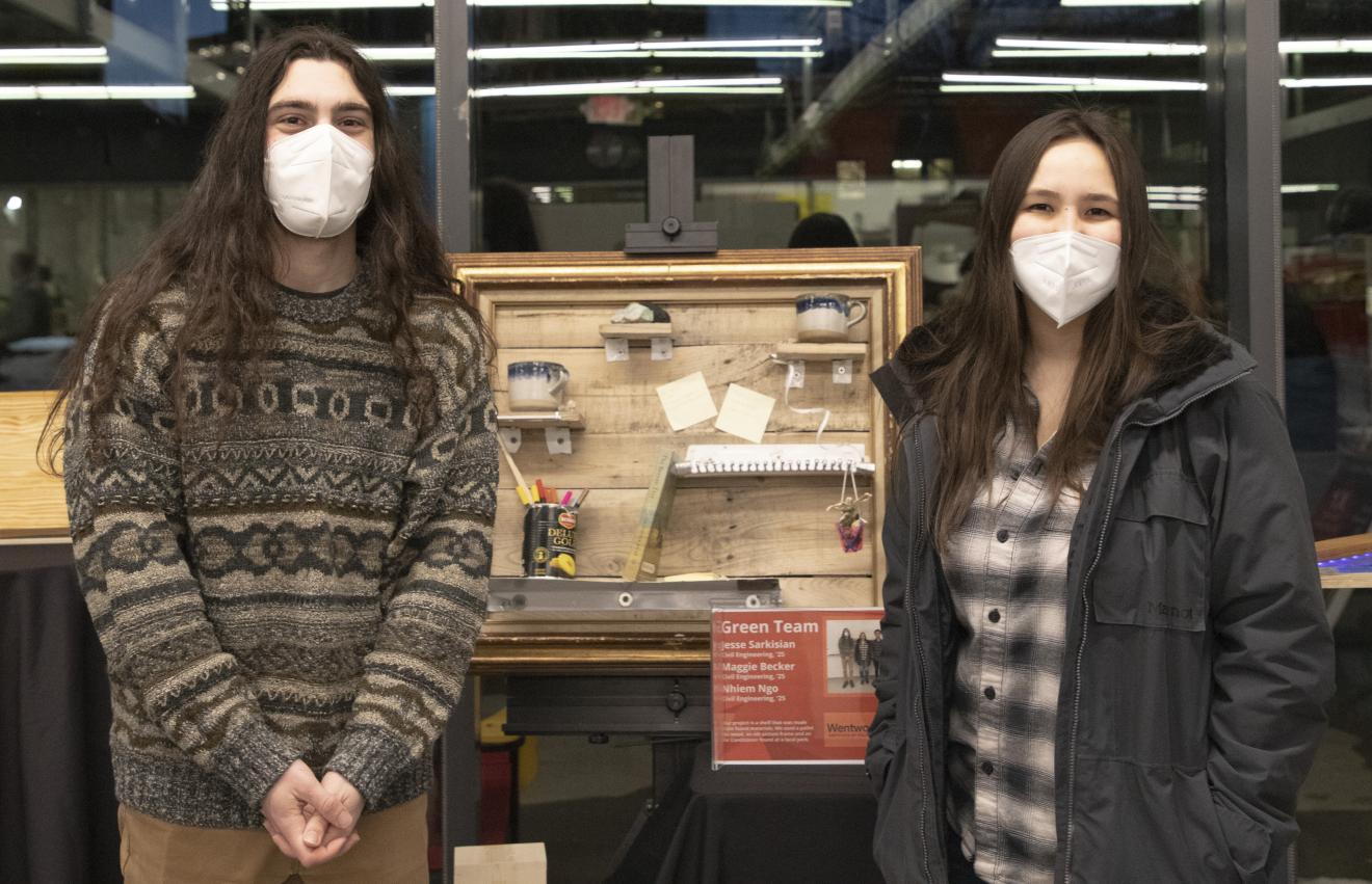 people posing with wooden shelf