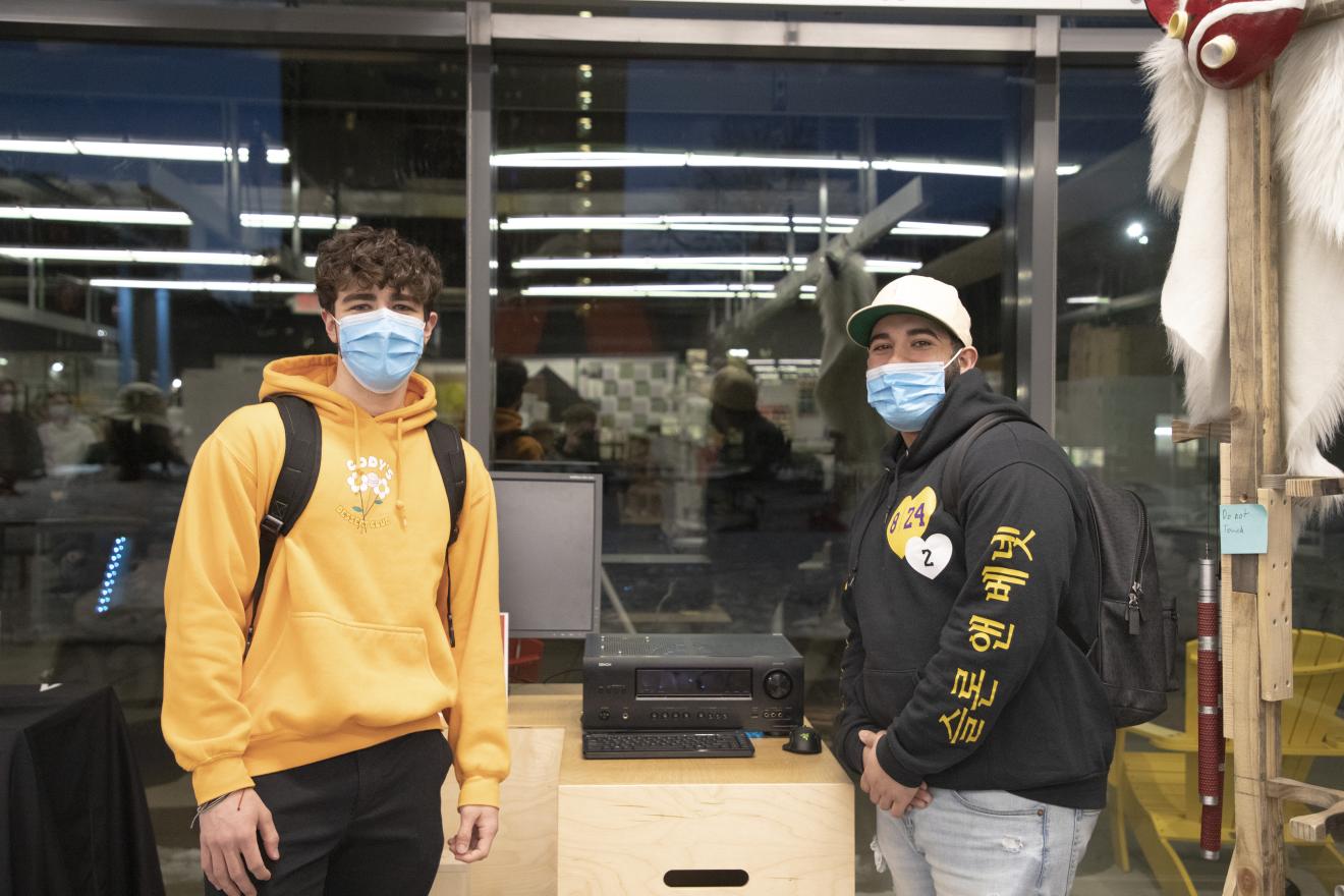 people posing with desktop computer