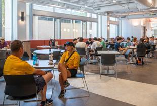 people eating in a dining hall