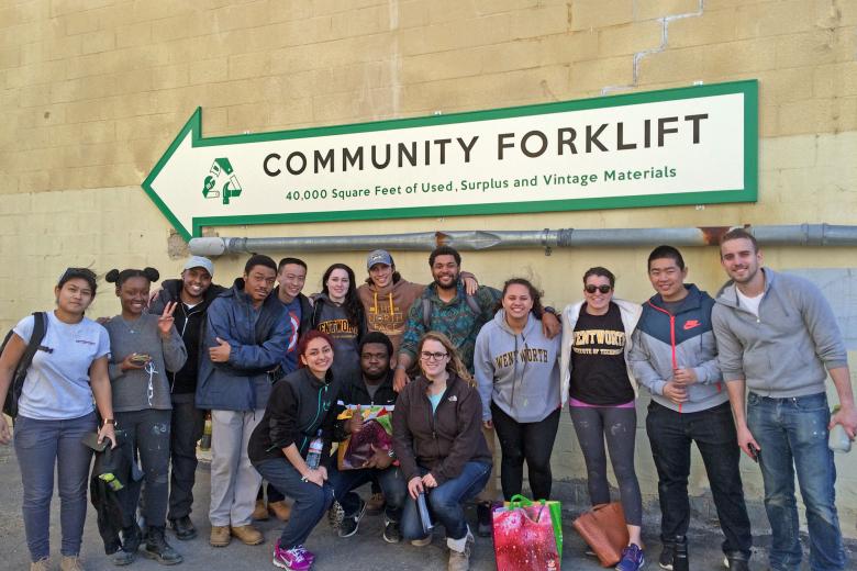 Students posing for a photo at Community Servings.