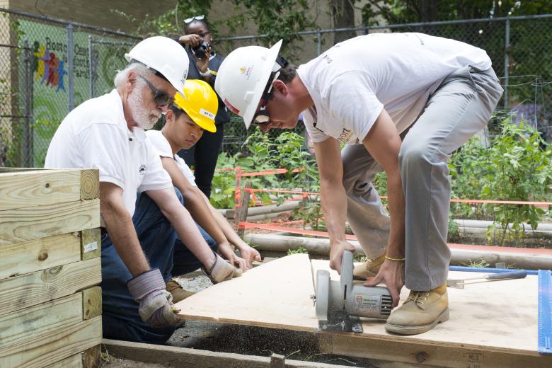 Students building a community shed.