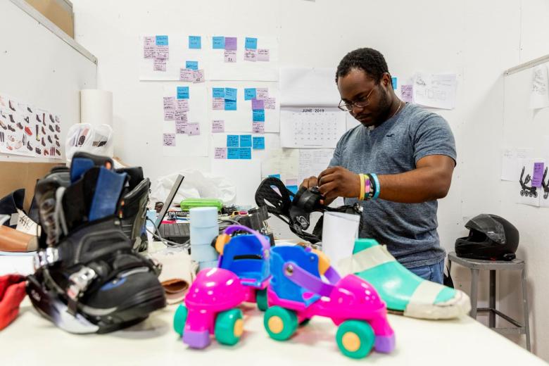 A student works on sneaker design in the industrial design lab