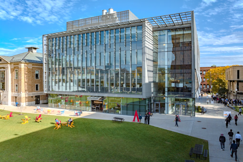 aerial view of a modern building and a grassy quad