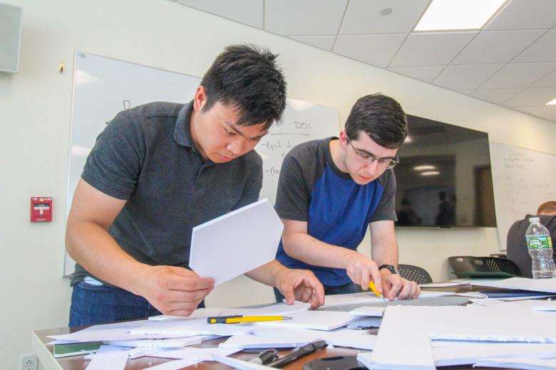 Two students working on a project