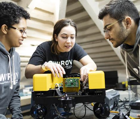 Students making a robot