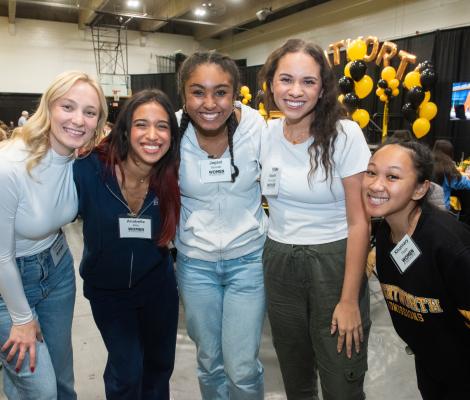 group of women posing for a picture