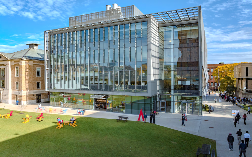 aerial view of a modern building and a grassy quad