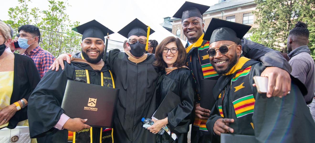 group of people wearing graduation robes