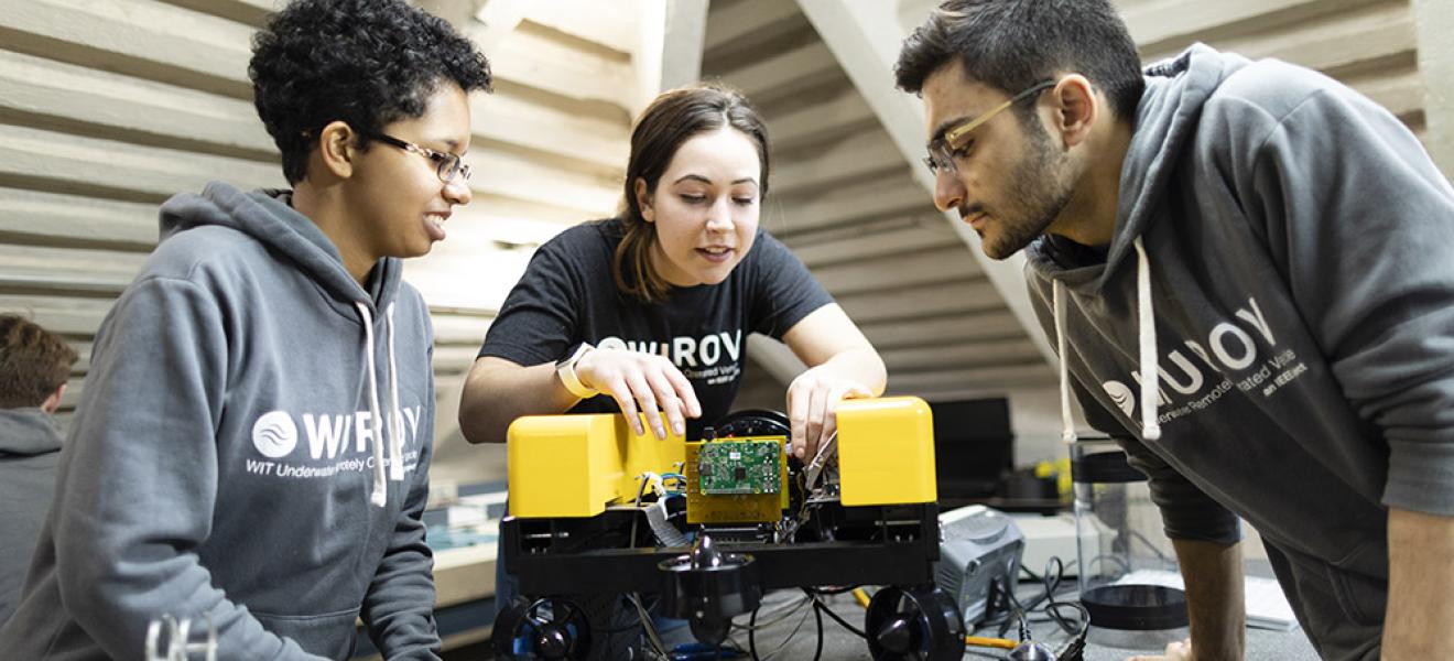 Students making a robot