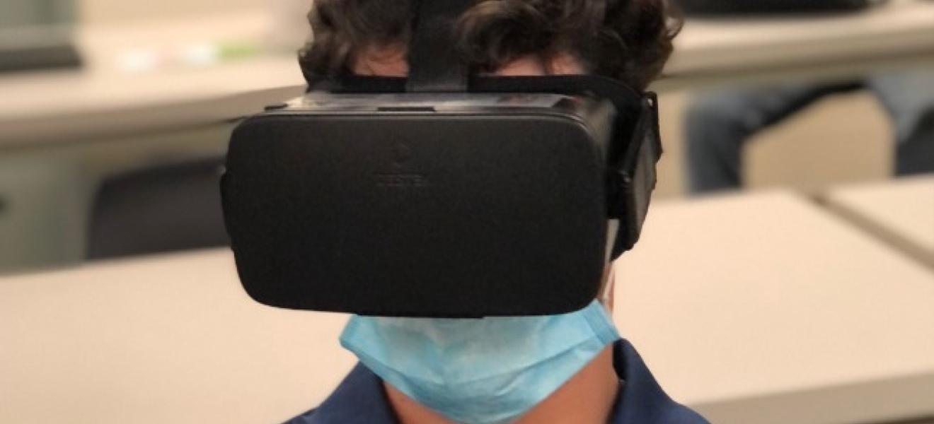 student wearing a virtual reality headset