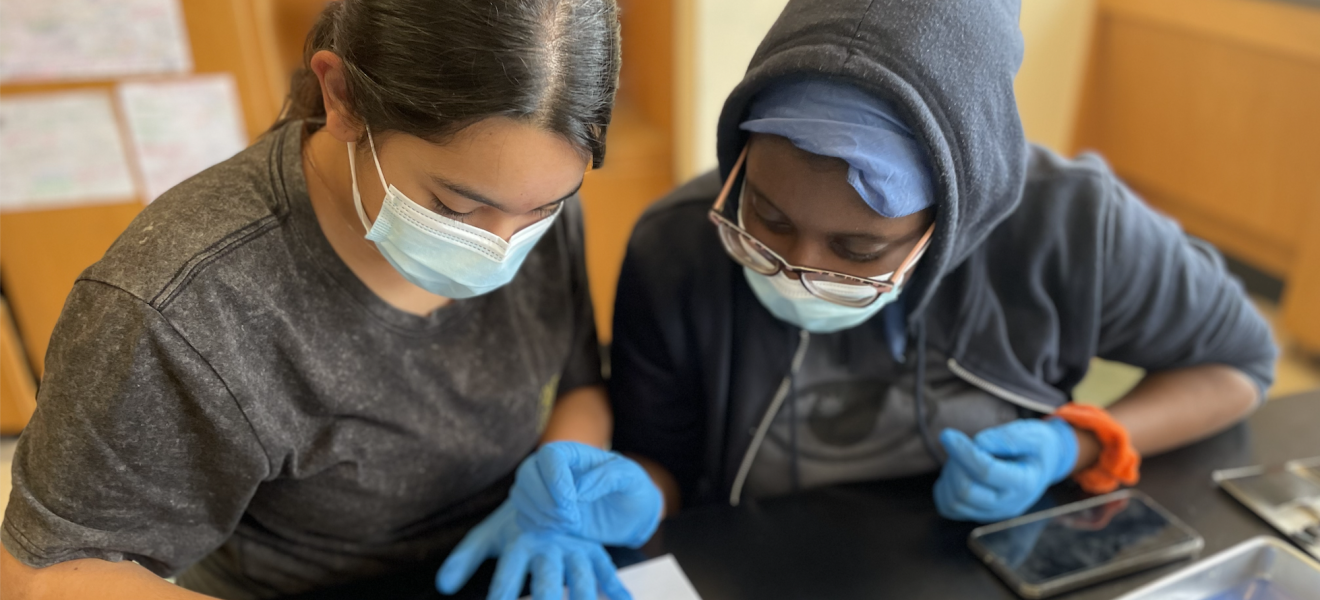 two students working in a lab