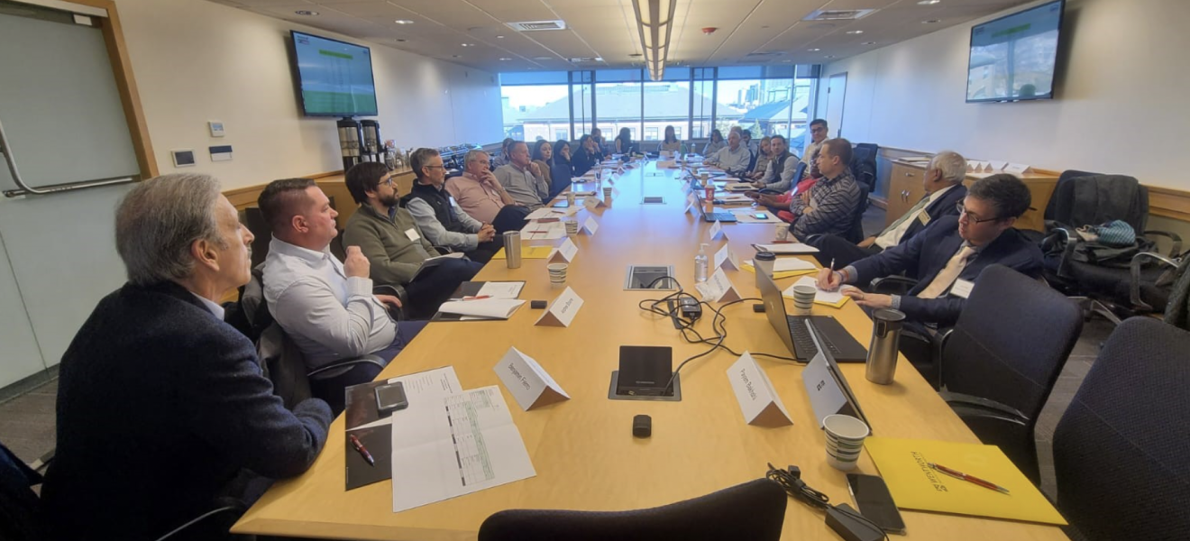 group of people at a long table