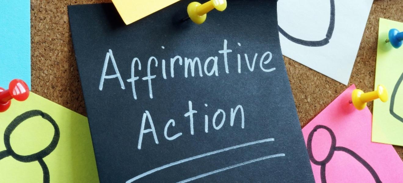 graphic showing a chalkboard that reads affirmative action