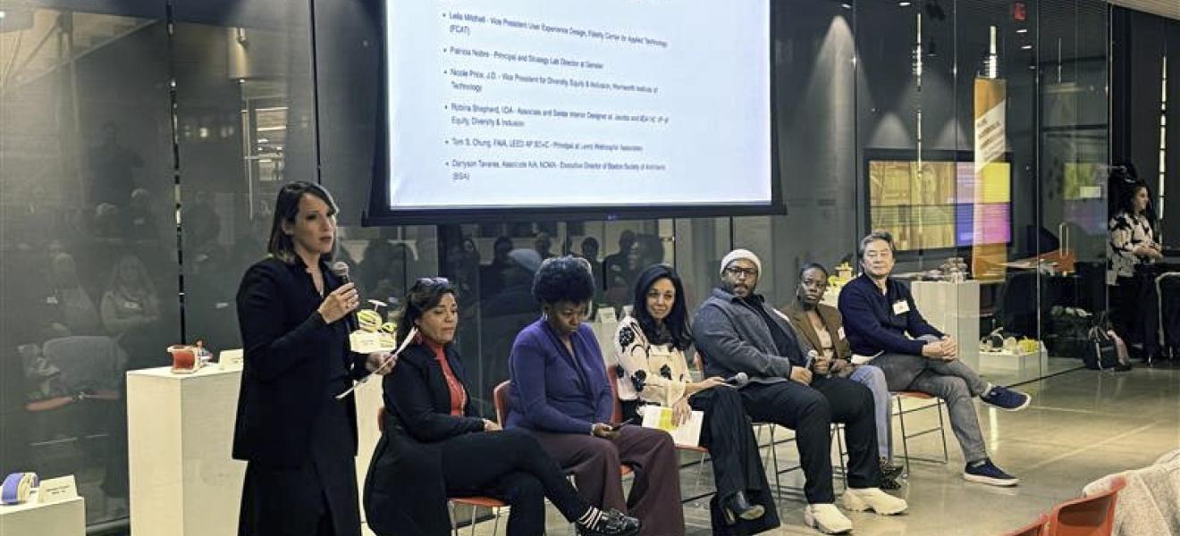 a panel of speakers at an event