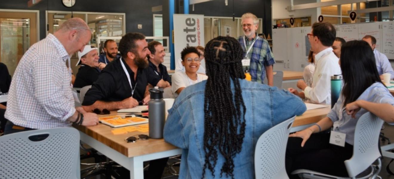 A group of people collaborating in a workspace