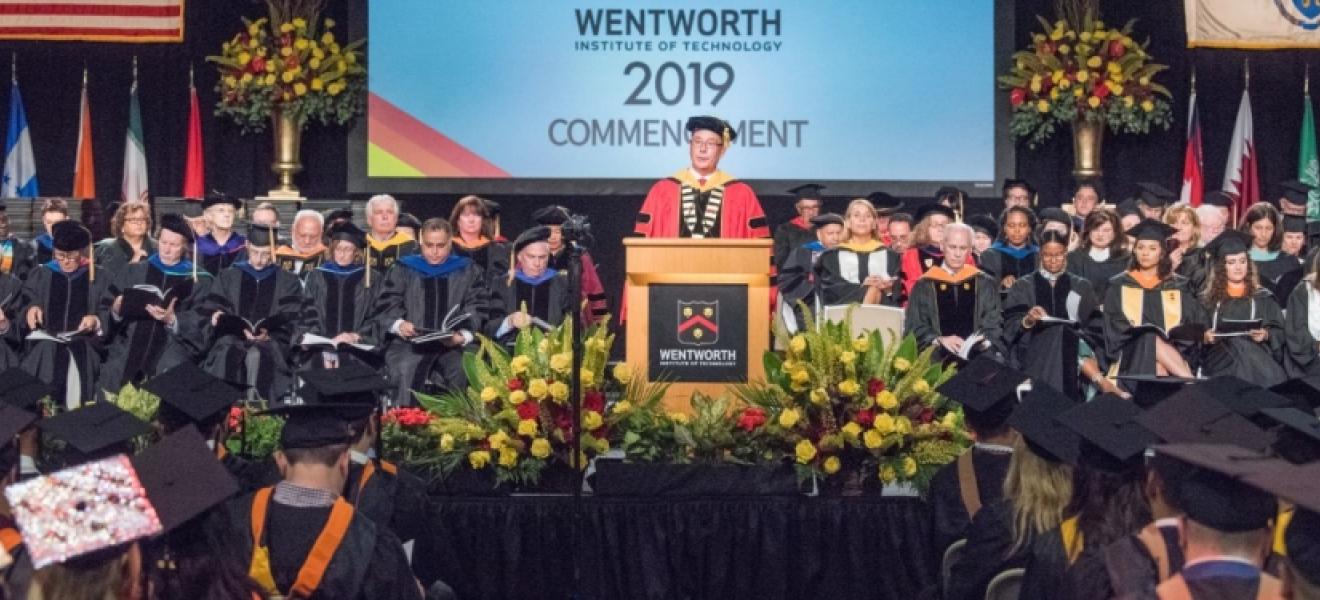 A man speaks at a graduation ceremony