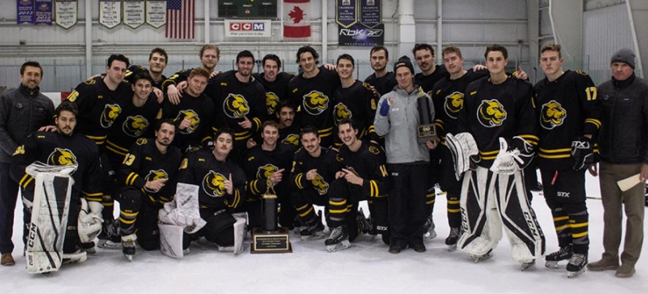 A group of hockey players on the ice